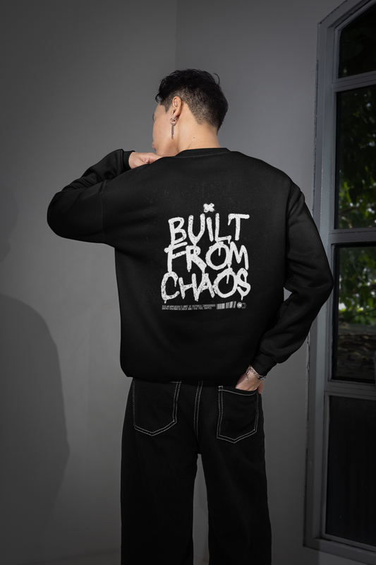 BUILT FROM CHAOS UNISEX SWEATSHIRT